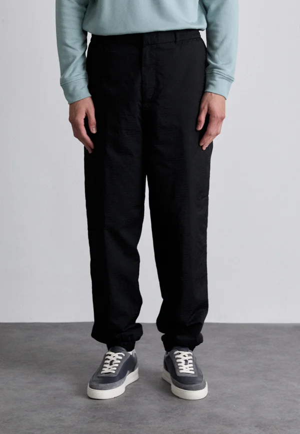 PANTALONI - Jogginghose - nero