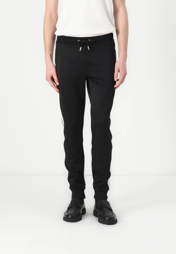 PANTS - Jogginghose - black