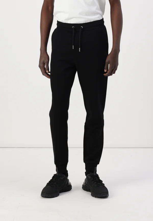 PANTS - Jogginghose - black