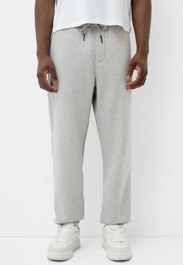 PLUSH - JOGGING - Jogginghose - mottled grey