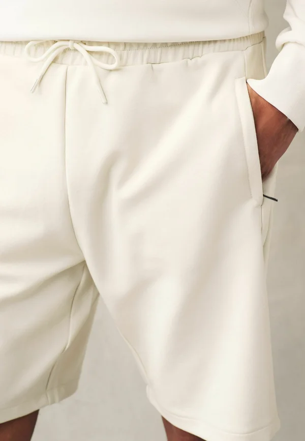 POCKET REGULAR FIT - Jogginghose - ecru