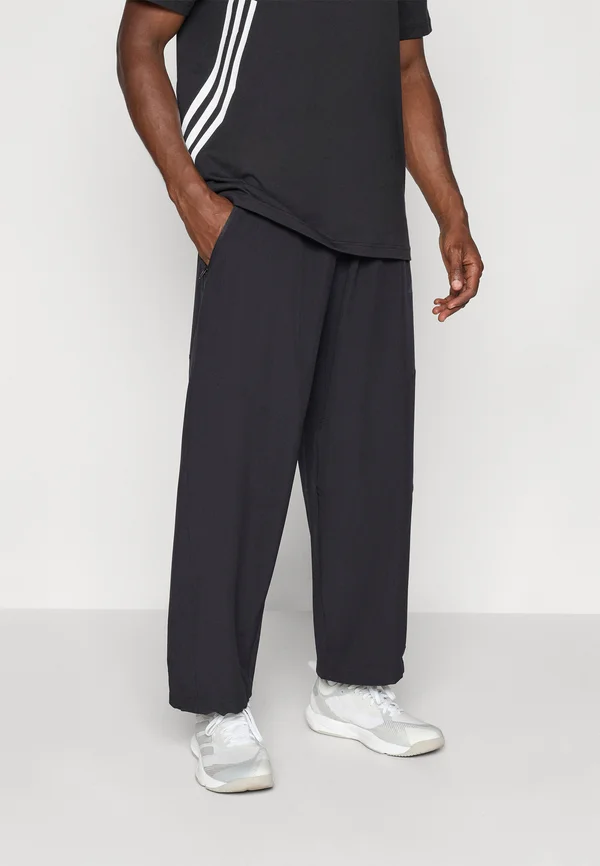 POWER PANT - Jogginghose - black