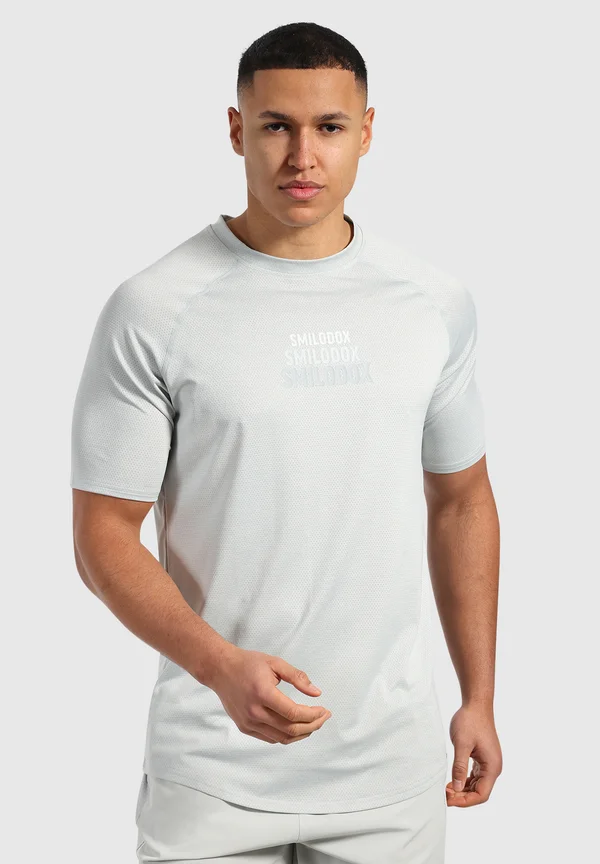POWERFIT TRIPLE - Sport T-Shirt - mint