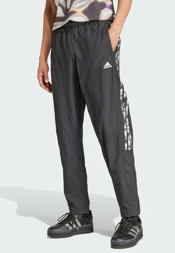 PRIDE TIRO - Jogginghose - black