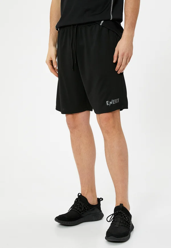 PRINTED - Jogginghose - black