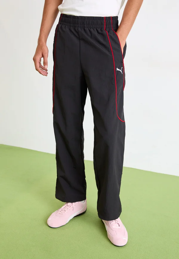 PUMATECH-X RELAXED TRACK PANT - Jogginghose - black/for all time red