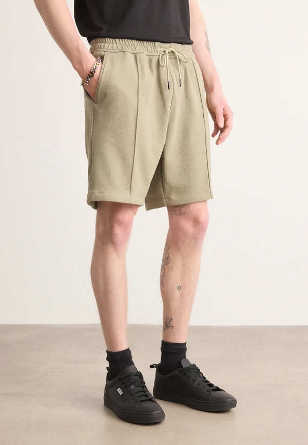RAVIS - Jogginghose - open green