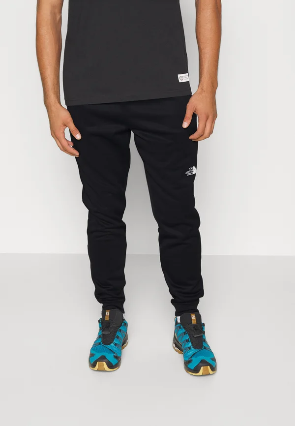 REAXION JOGGER - Jogginghose - black