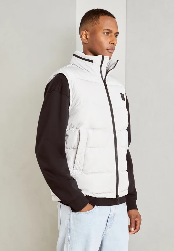 REGULAR FIT IN TECHNO WITH PADDING DUPONT SORONA WITH LOGO PATCH - Weste - ice