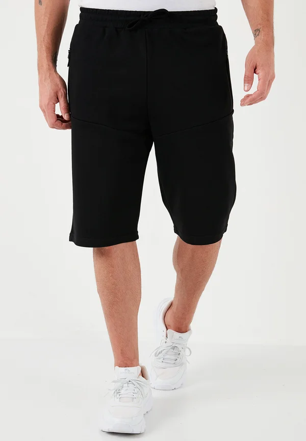 REGULAR FIT - Jogginghose - black