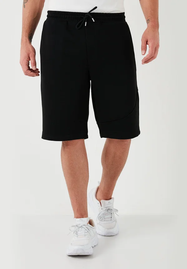 REGULAR FIT - Jogginghose - black