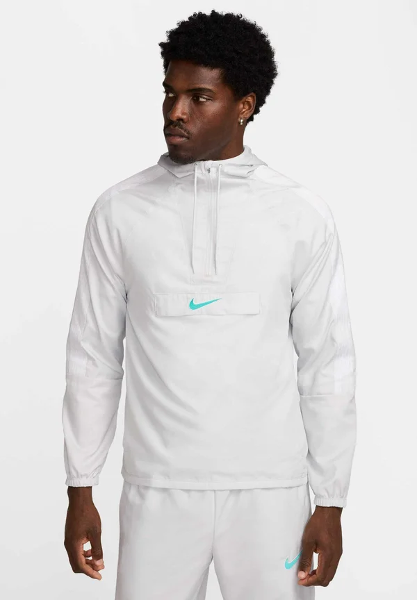 REPEL ANORAK - Trainingsjacke - photon dust dynamic turquoise