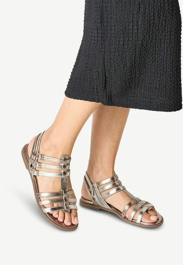 Riemensandalette - bronce comb