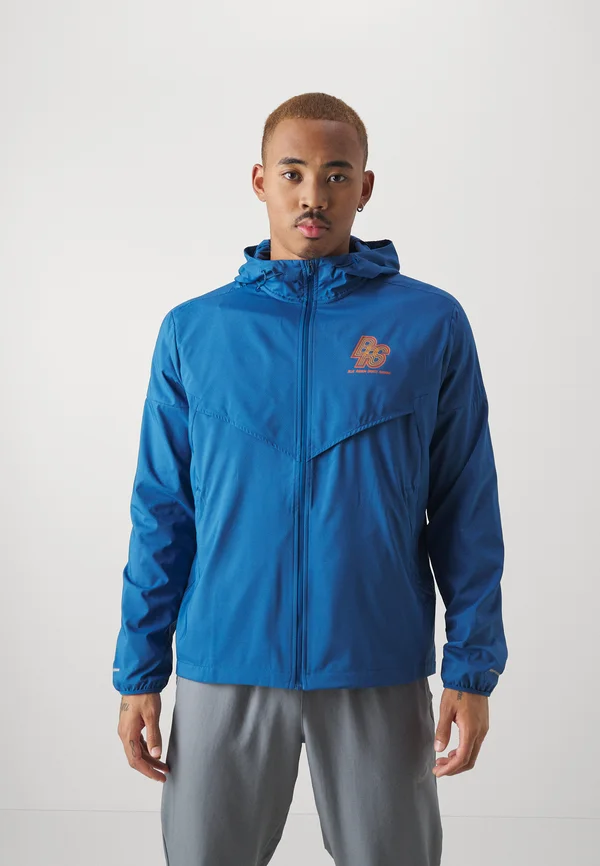 RUN ENERGY WINDRUNNER - Laufjacke - court blue/safety orange
