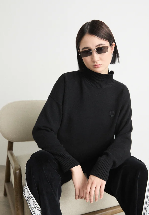 SESTY - Strickpullover - black