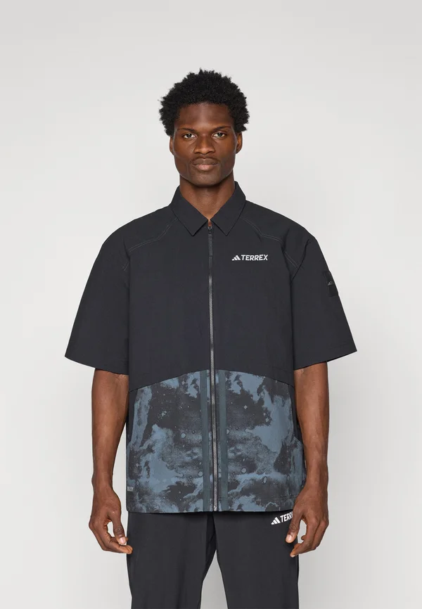 SHORT SLEEVE - Windbreaker - black