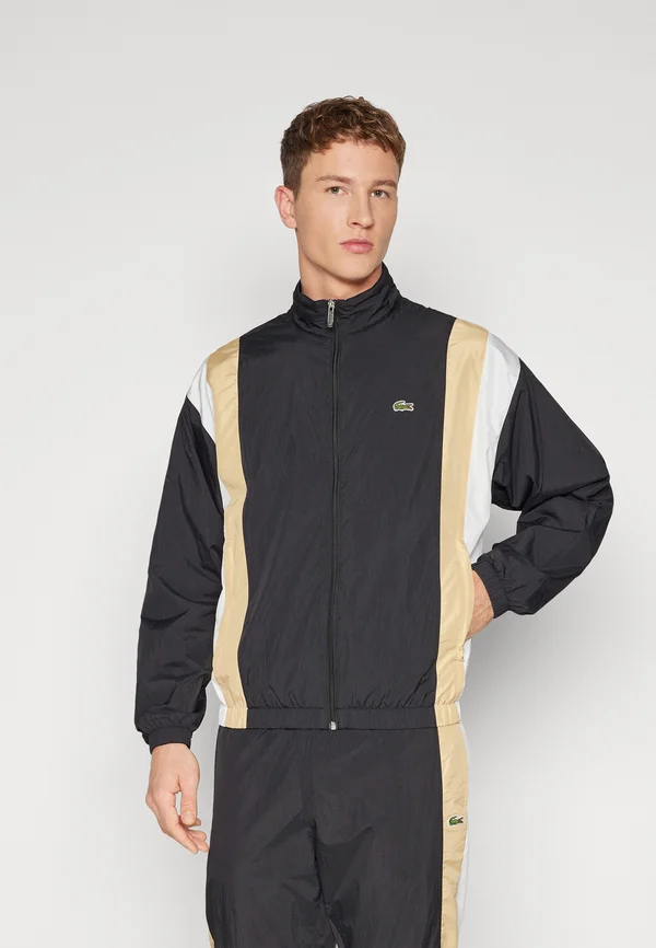 SHOWERPROOF TRACKJACKET - Leichte Jacke - black/croissant flour