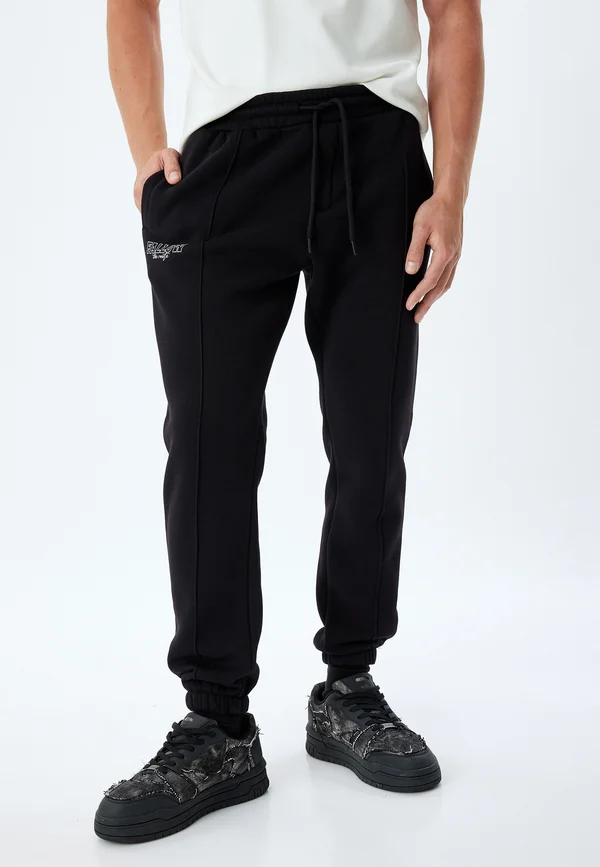 SPORT - Jogginghose - black