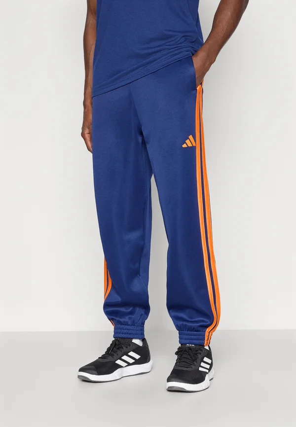 STADIUM - Jogginghose - dark blue/pure orange
