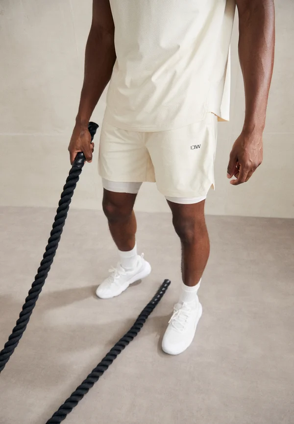 STRIDE - Kurze Sporthose - cream