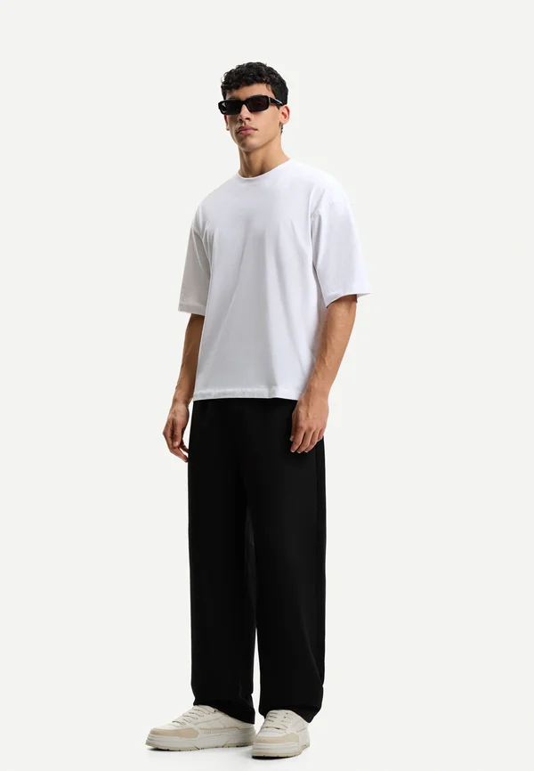 TAILORED FIT - Jogginghose - black