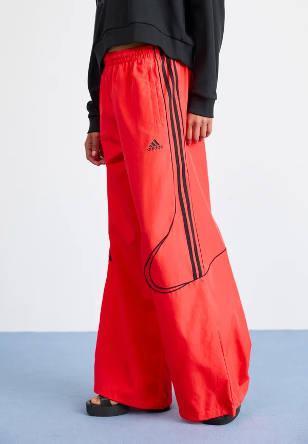 TEAMGEIST - Jogginghose - lucid red/black