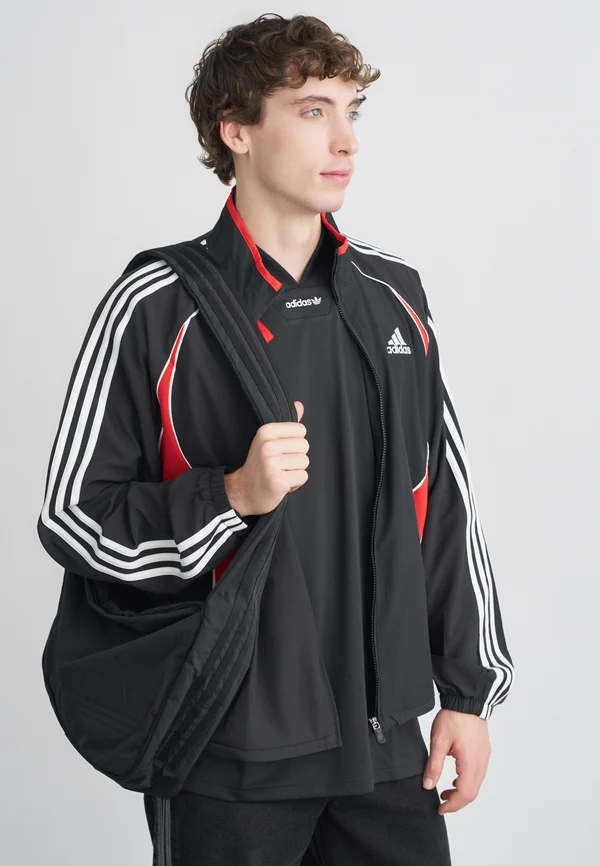 TEAMGEIST  - Trainingsjacke - black/better scarlet