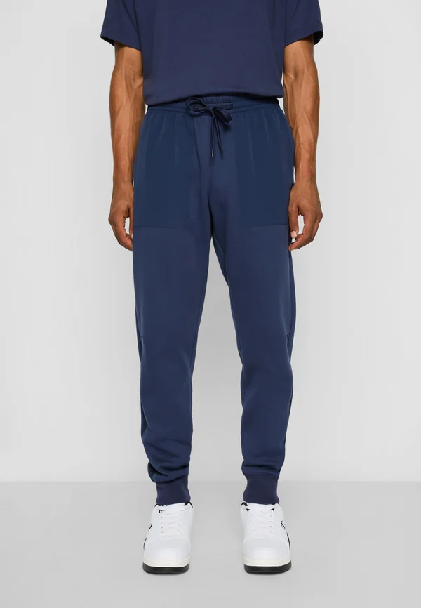 TECH CUFF PANTS - Jogginghose - nava