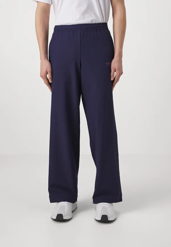 TECH LOUNGE PANTS UNISEX - Jogginghose - evning blue