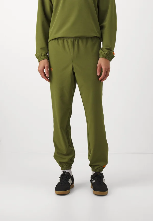 TECH PANTS UNISEX - Jogginghose - pesto