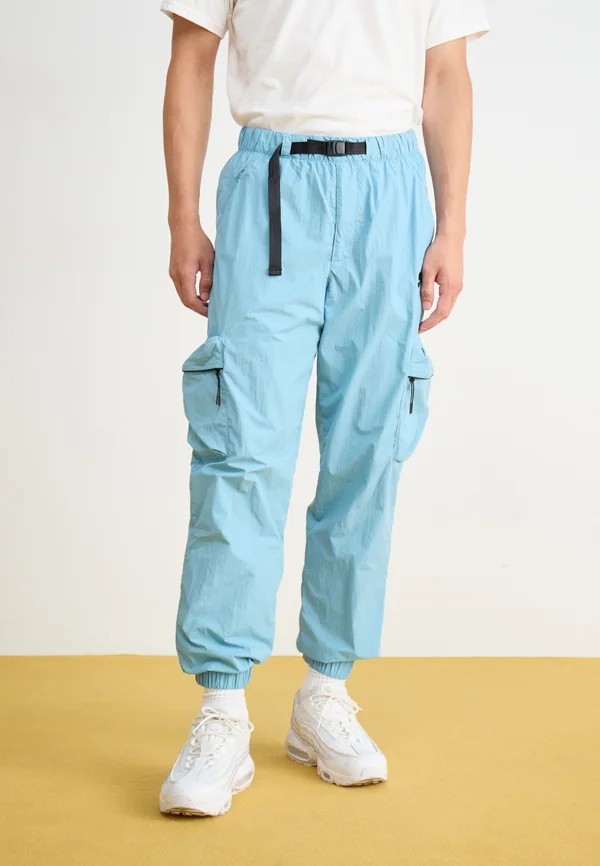 TECH WOVEN - Cargohose - denim turquoise/black