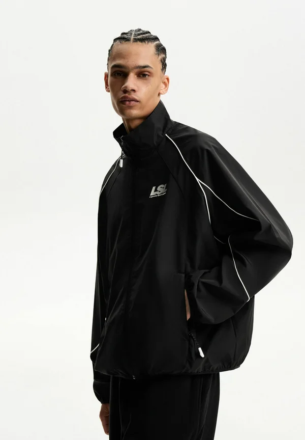 TECHNICAL - Übergangsjacke - black