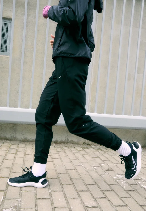 TEMPO WARM PANT - Jogginghose - black/reflective silver-coloured