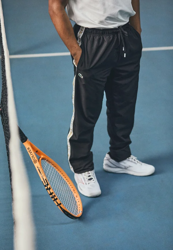 TENNIS PANT - Jogginghose - black