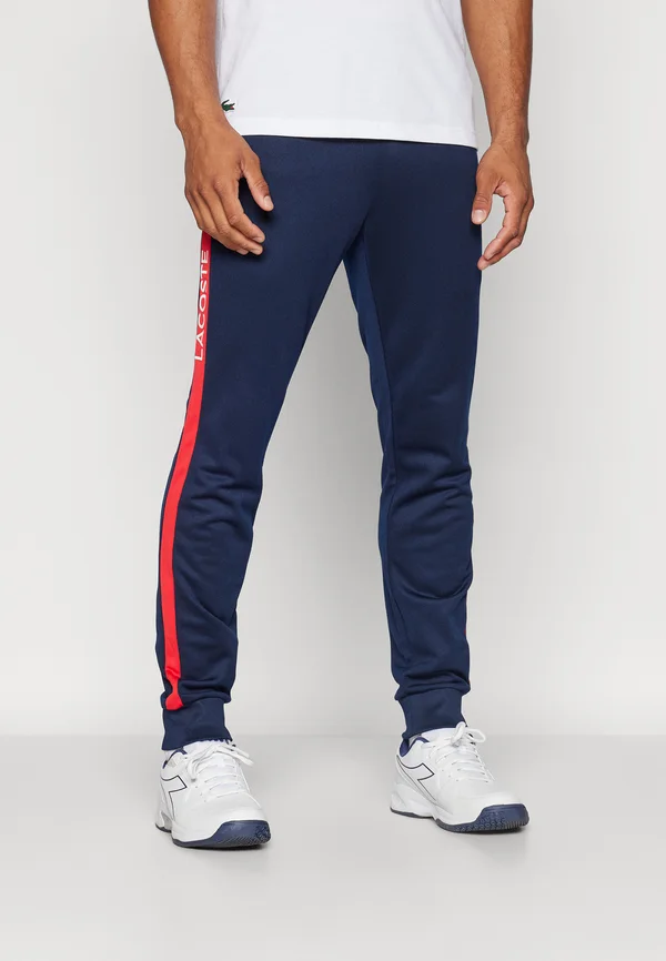 TENNIS PANT - Jogginghose - navy blue/grenadine