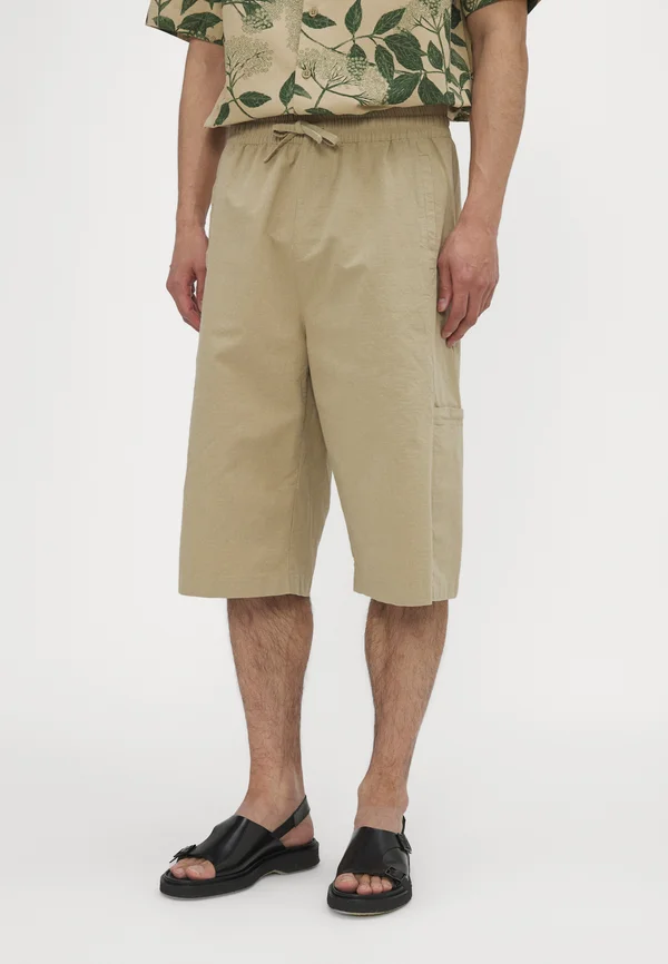 TEVY UNISEX - Shorts - beige