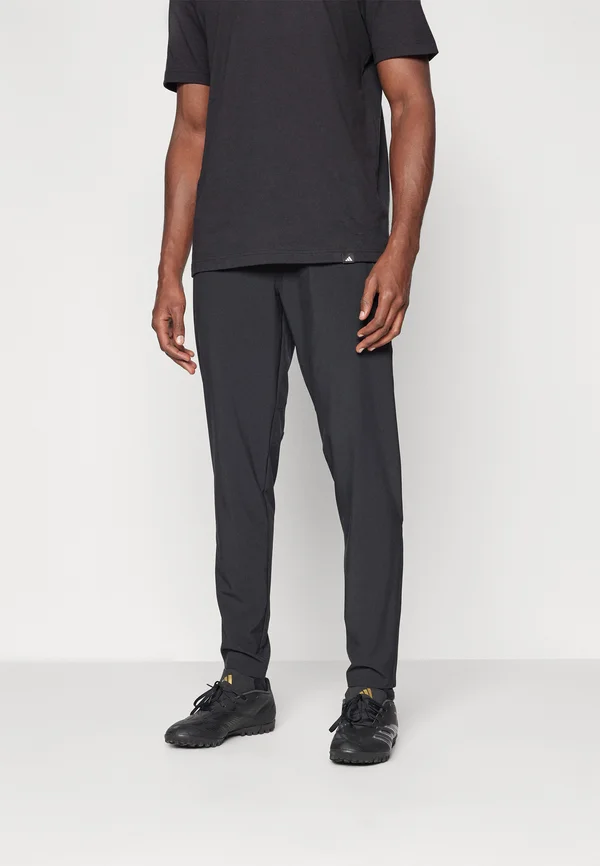 TIRO 25 COMPETITION VIS TECH TRAVEL PANTS - Jogginghose - black