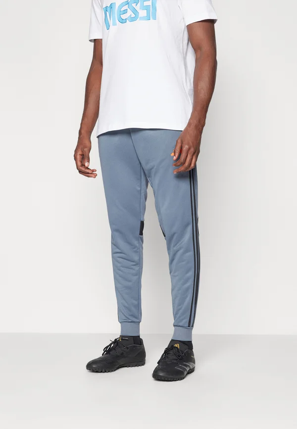 TIRO 25 ESSENTIALS - Jogginghose - team onix/super orange