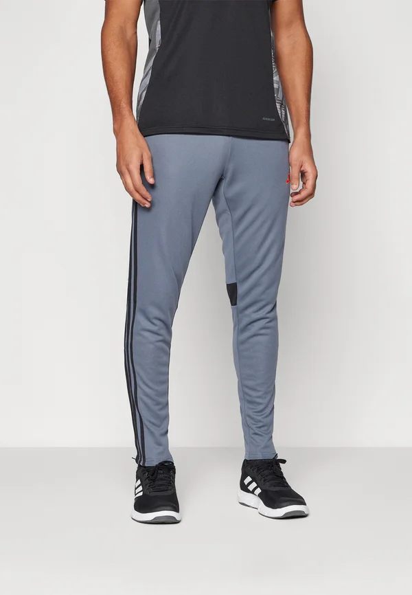 TIRO 25 ESSENTIALS - Jogginghose - team onix/super orange