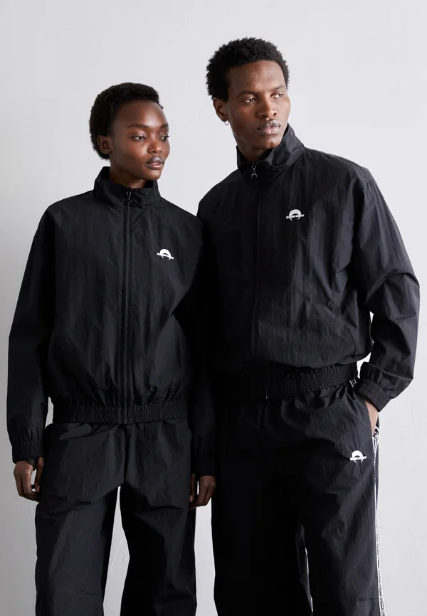 TRACK JACKET UNISEX - Leichte Jacke - black