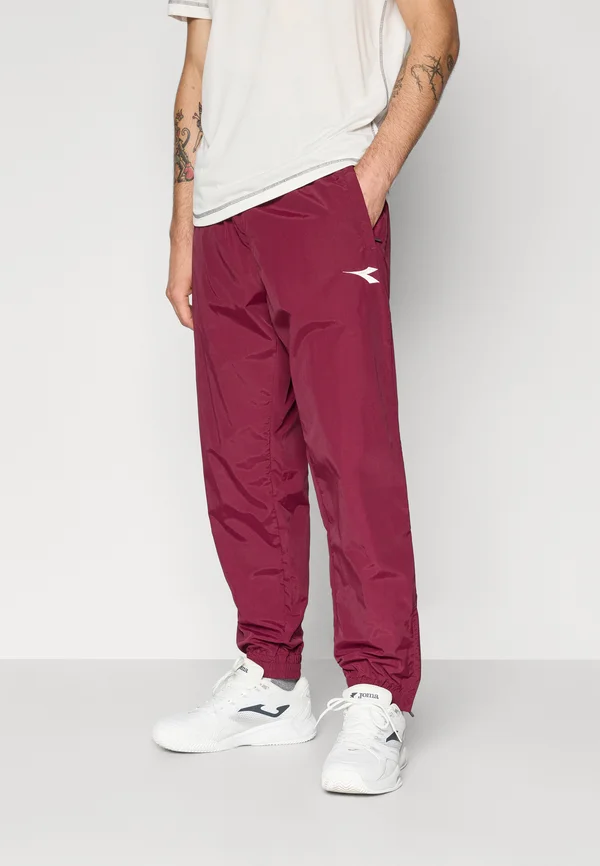 TRACK PANTS ICON - Jogginghose - maroon banner