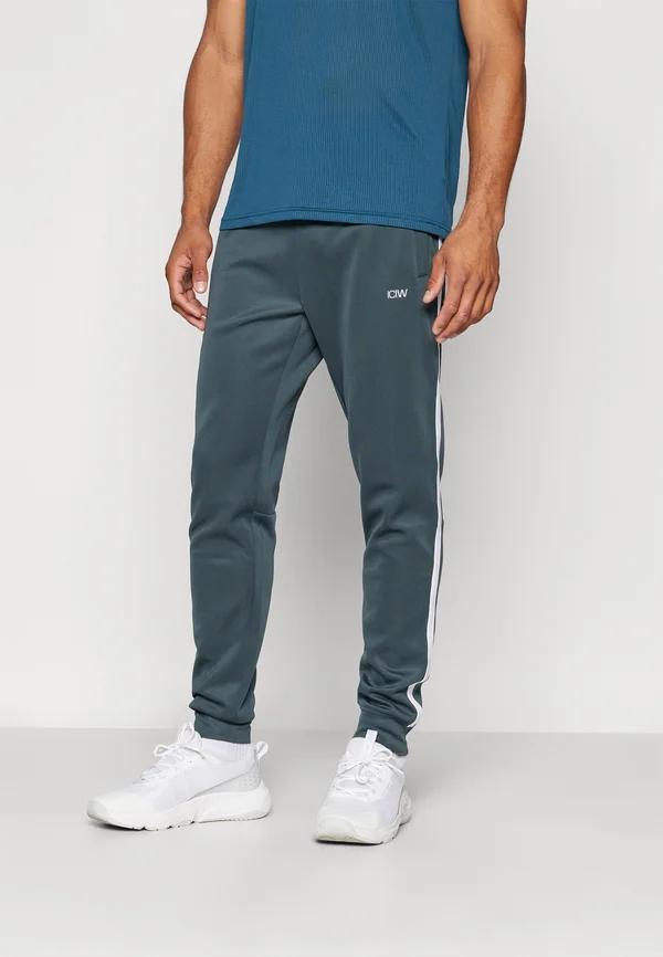 TRACK PANTS - Jogginghose - dark green
