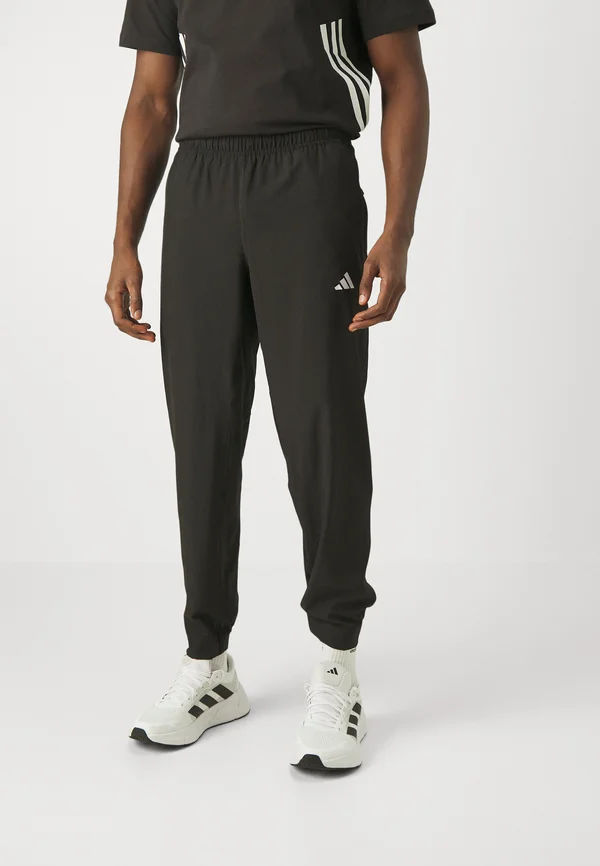TRAIN ESSENTIALS TRAINING PANTS - Jogginghose - black/white