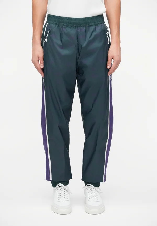 TRAIN GRAPHIC SERIES PANTS MONOGRAM - Jogginghose - dark green fancy
