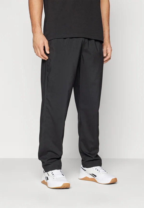 TRAIN UNLINED PANT - Jogginghose - black