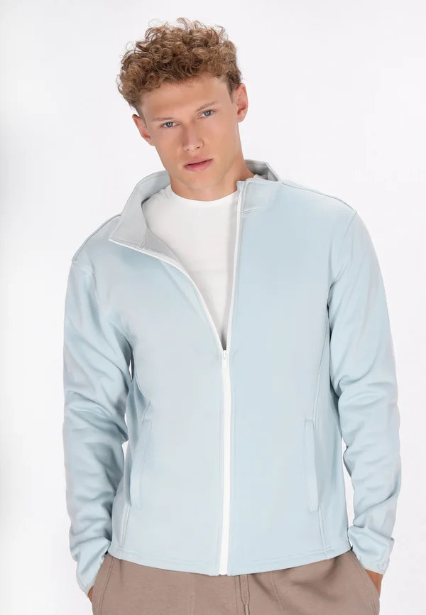 Trainingsjacke - blasses türkis weiss