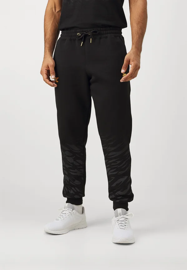 UFC AUTHENTIC FIGHT NIGHT REPLICA MENS JOGGERS - Jogginghose - black/gold
