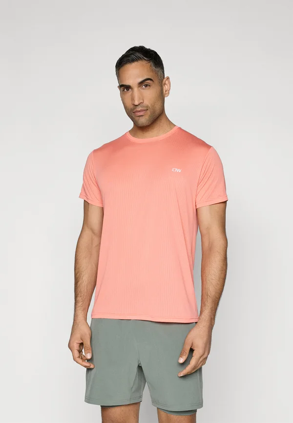 ULTIMATE TRAINING TEE - Sport T-Shirt - light pink peach