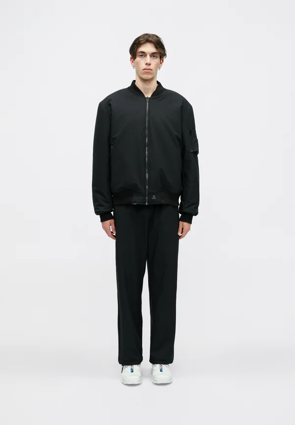 UNISEX - Jogginghose - black