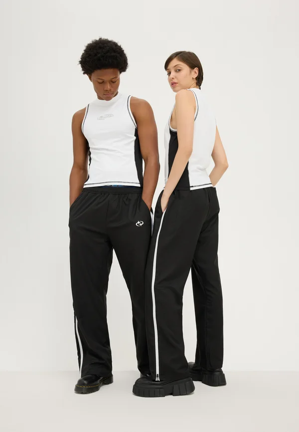 UNISEX - Jogginghose - black